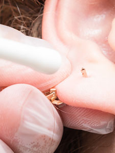 Is the piercing process painful? How long does the process take?